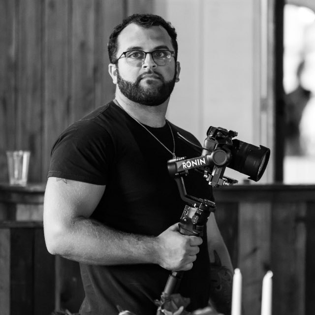 Jake Mantel with camera — Jackrabbit Marketing